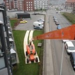 Asennus erkkeri-ikkunan päällä  Kööpenhaminassa